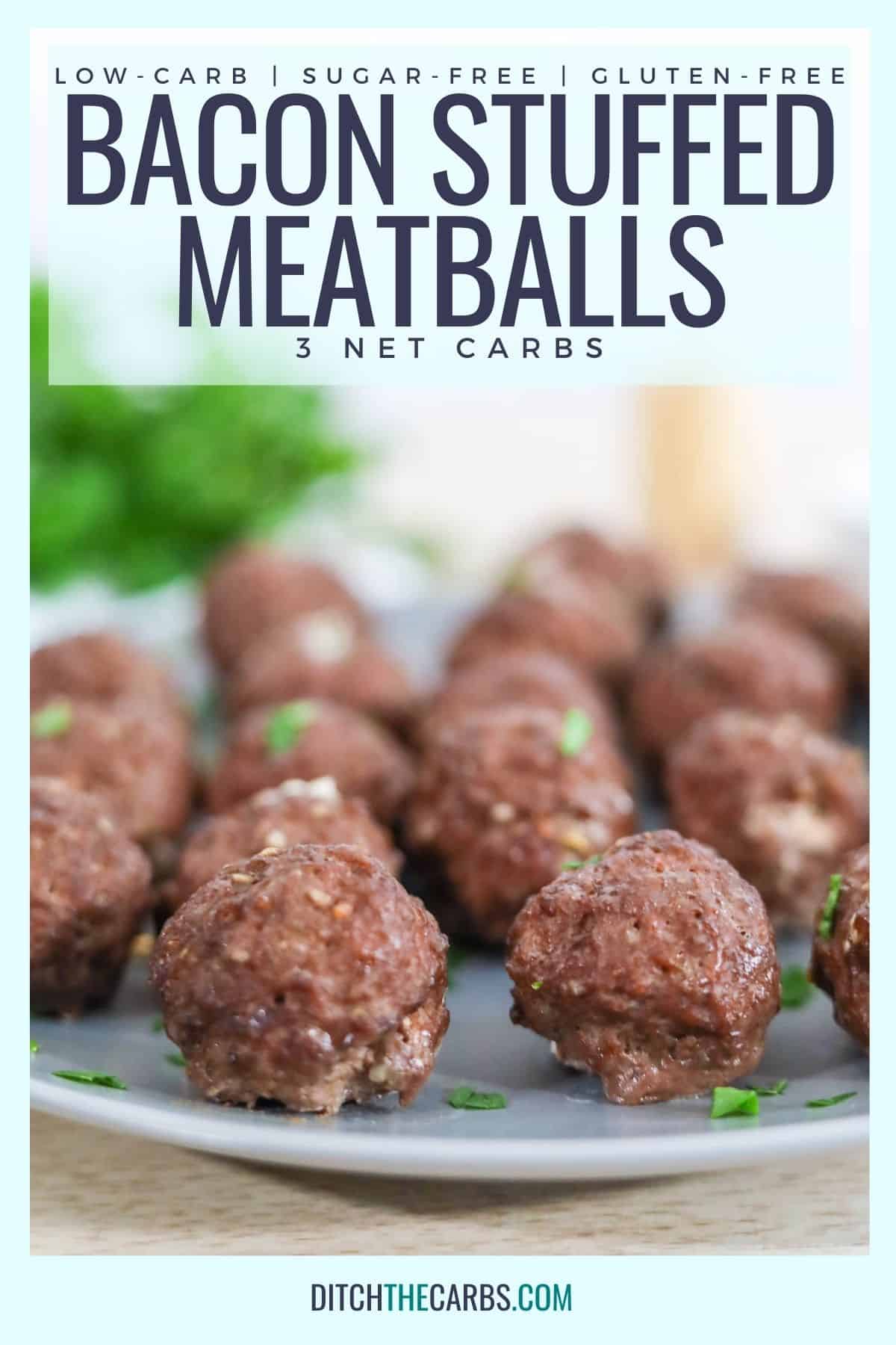 keto bacon meatballs on a grey platter with toothpicks