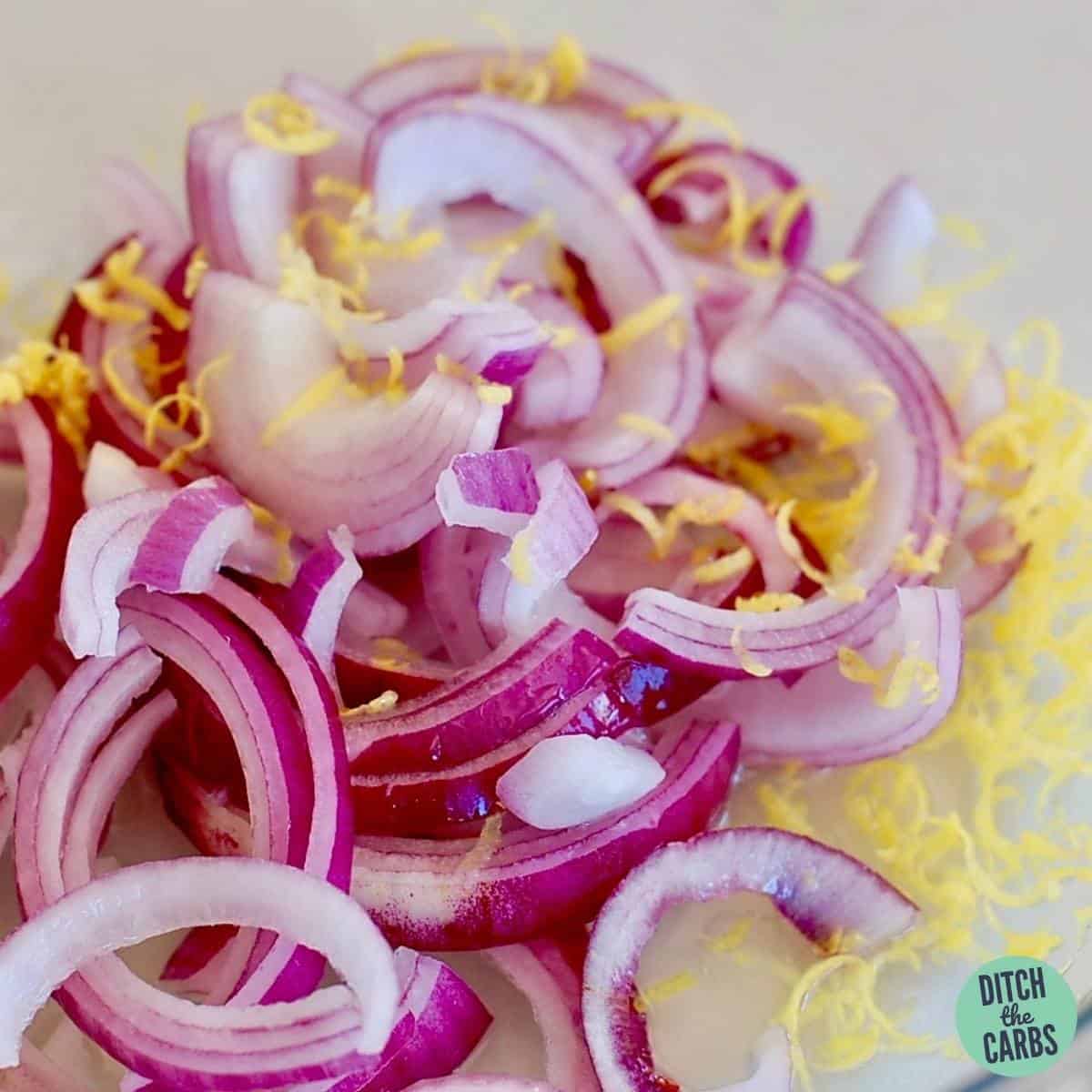 sliced red onions and lime zest