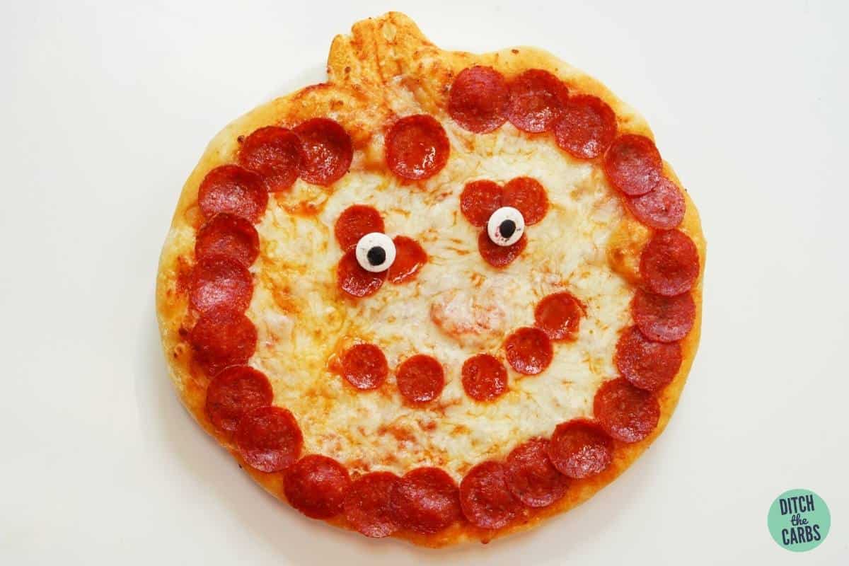 pizza decorated to look spooky