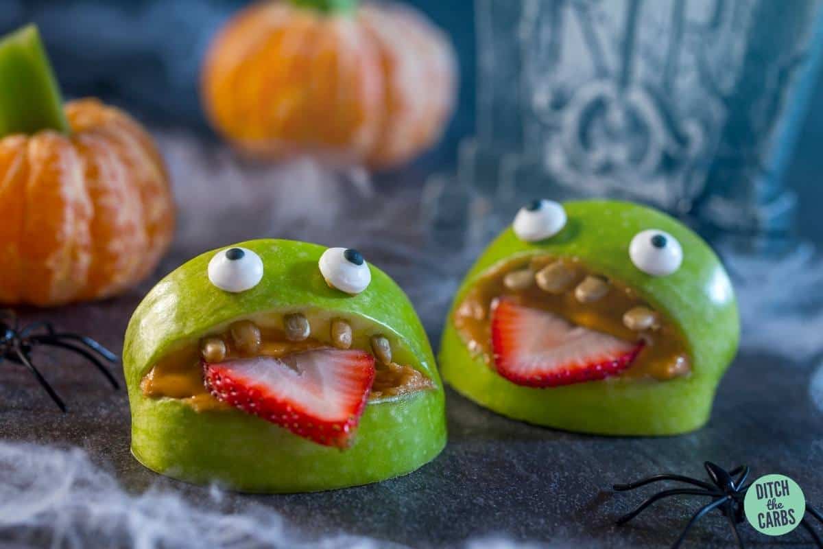 fruit carved to look like Halloween creatures