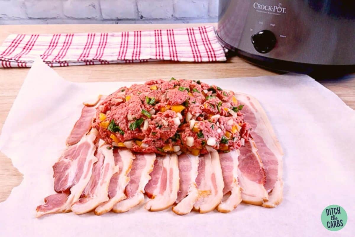 meatloaf being wrapped in bacon