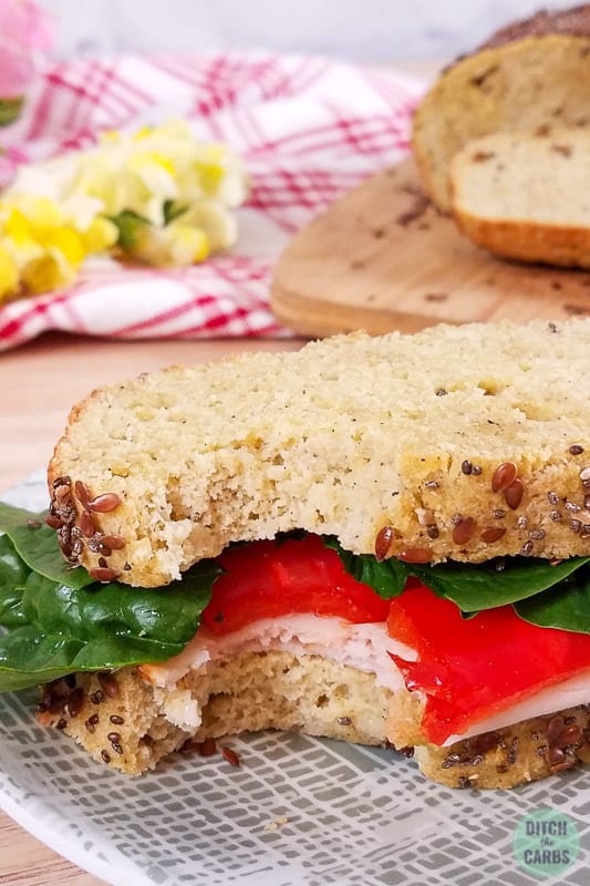A close up of low-carb coconut flour bread sandwich on a plate 