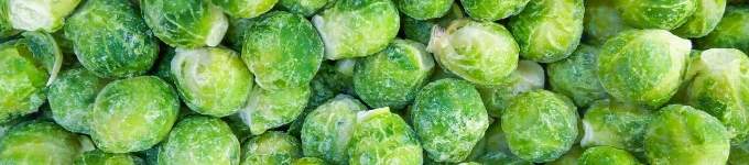 A close up of frozen Brussels sprouts