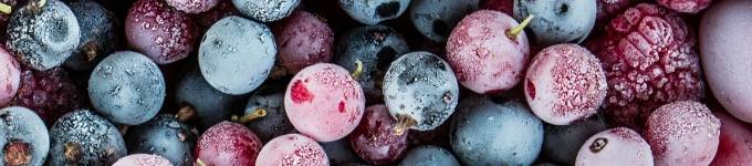 A close up of frozen berries