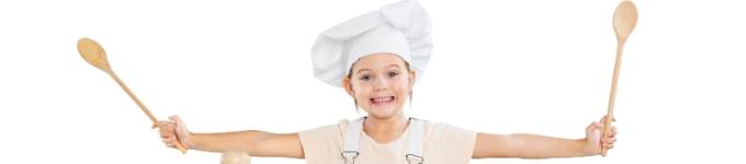 Little girl wearing a chef outfit