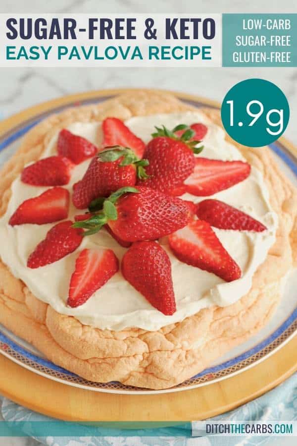 Pavlova served with berries and whipped cream
