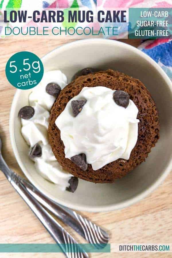 Double chocolate mug cake in a blue dish served with cream