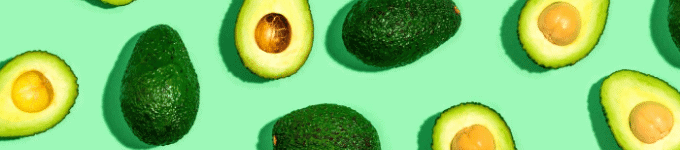 banner showing avocados on green background