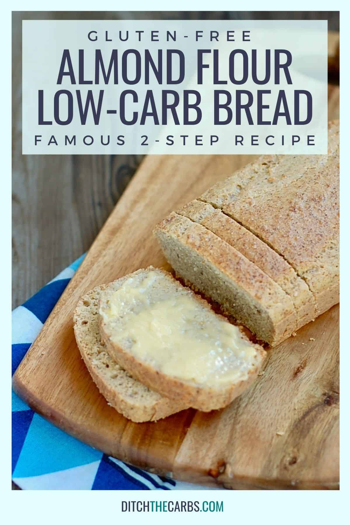 low-carb almond flour bread sliced and buttered on a wooden chopping board