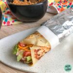 Copycat Low-Carb Taco Bell burrito rolled and wrapped in foil.