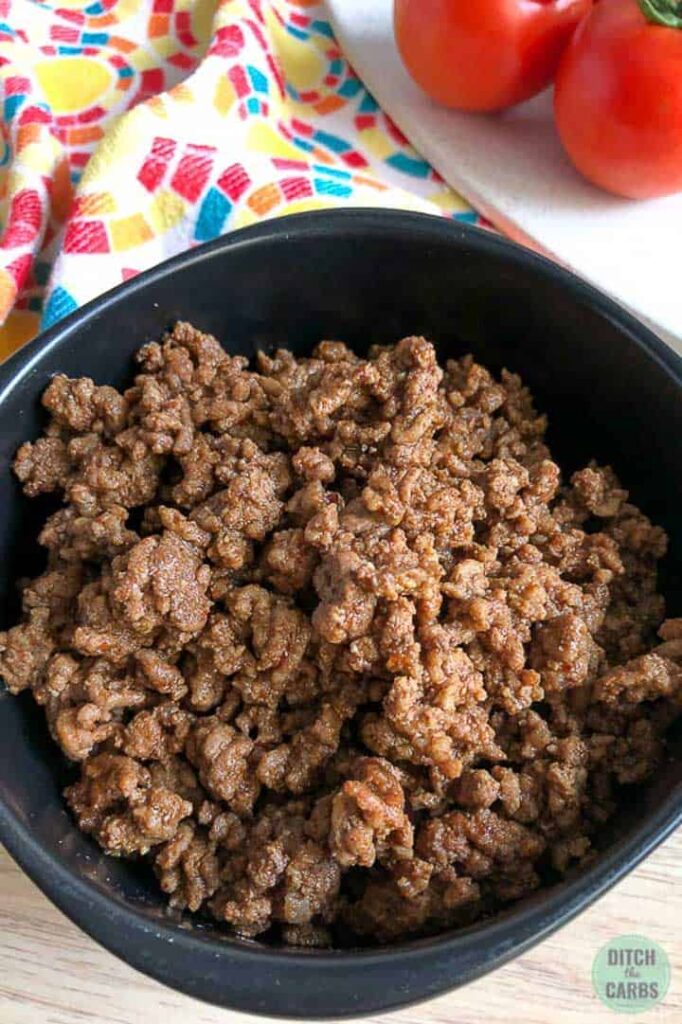 Cooked keto Taco Bell ground beef taco meat in a black bowl.