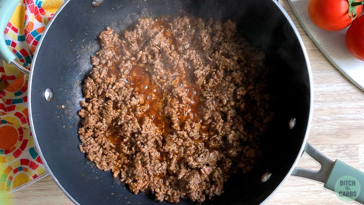 Keto Taco Bell taco meat finishing cooking in the skillet.