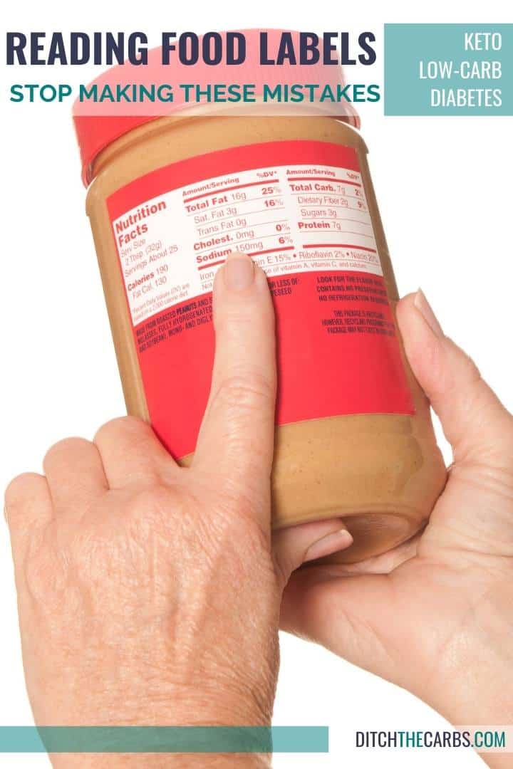 food label showing carbohydrates in peanut butter held by hands