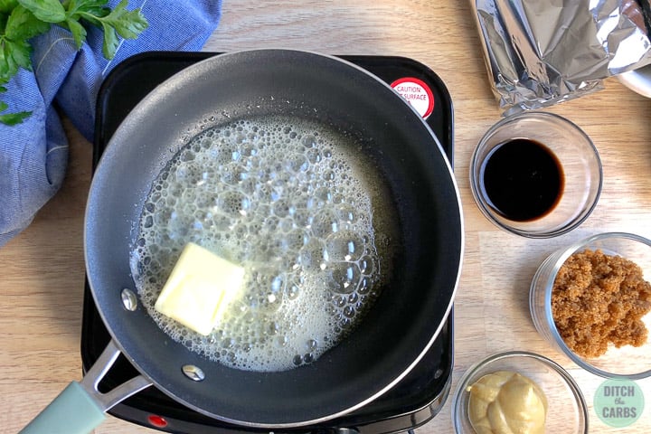 A saucepan with butter melting and bubbling