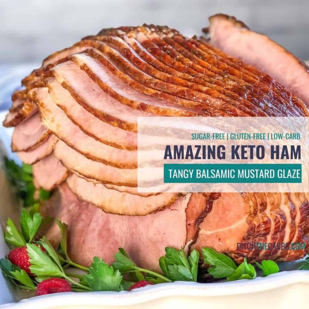 A cooked and glazed sliced ham with herb garnish