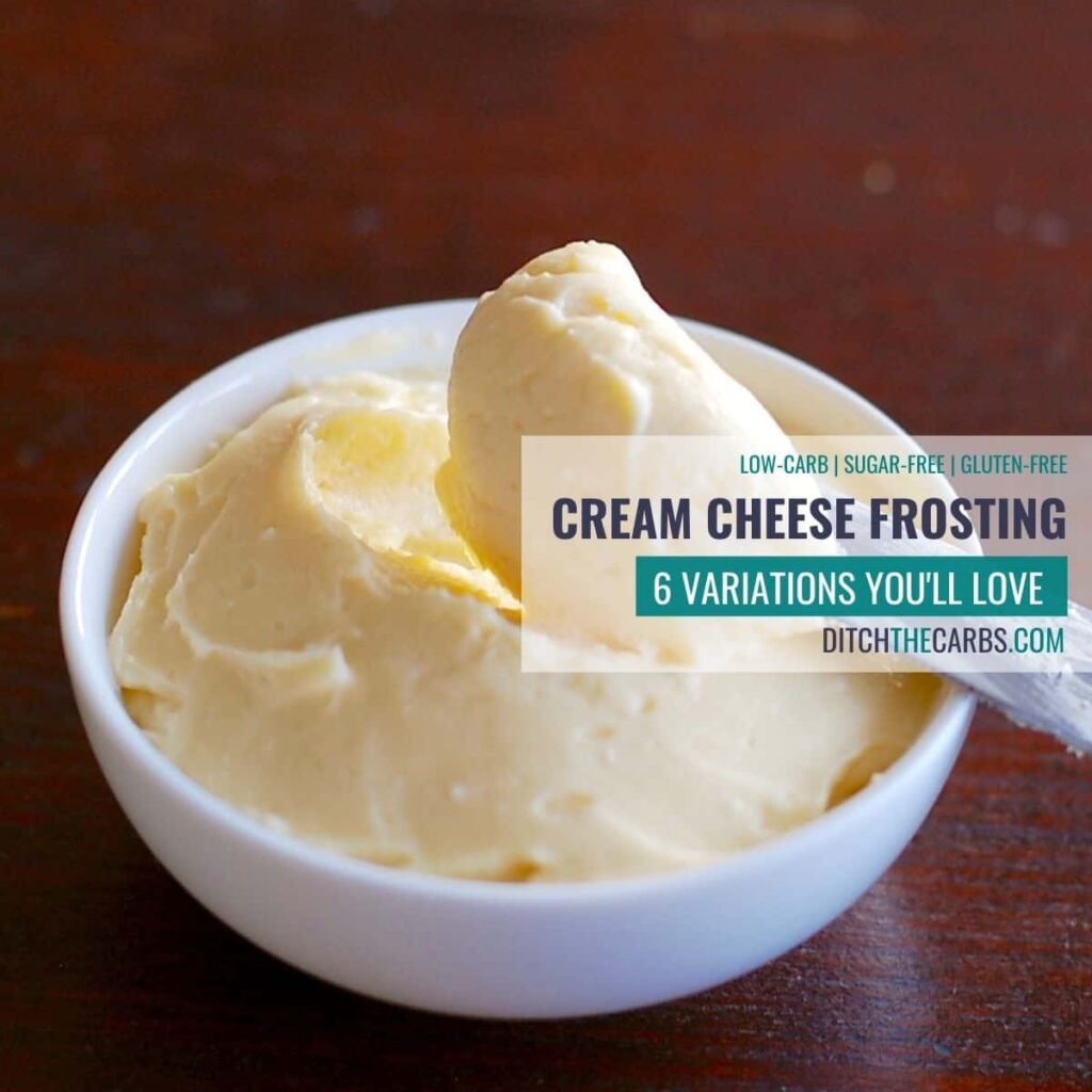 easy keto cream cheese frosting in a white bowl scooped with a silver knife