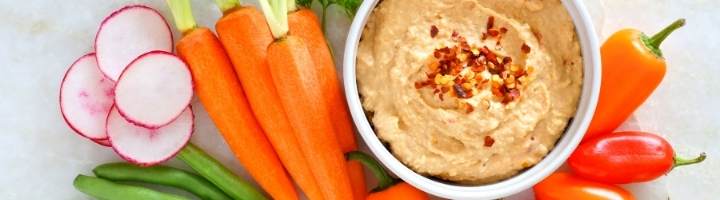 banner showing hummus and carrots