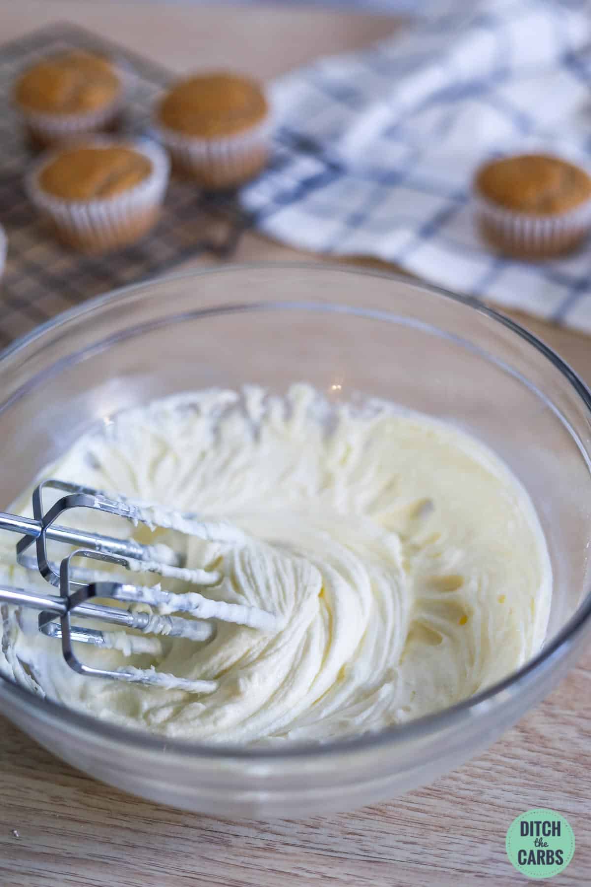 whisks and cream cheese frosting