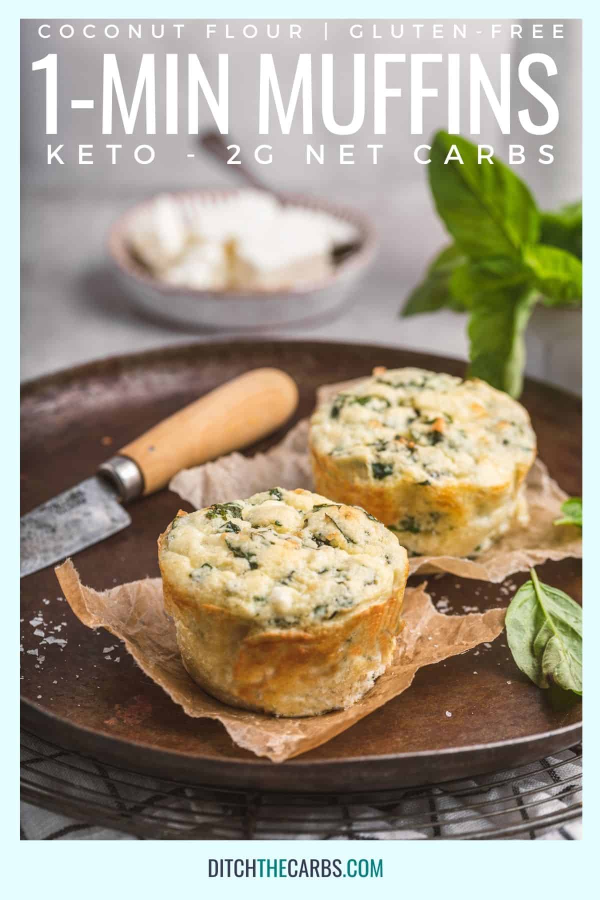 2 spinach and feta keto muffins on a dark pottery plate