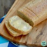 healthy low-carb almond flour bread and butter on bread board