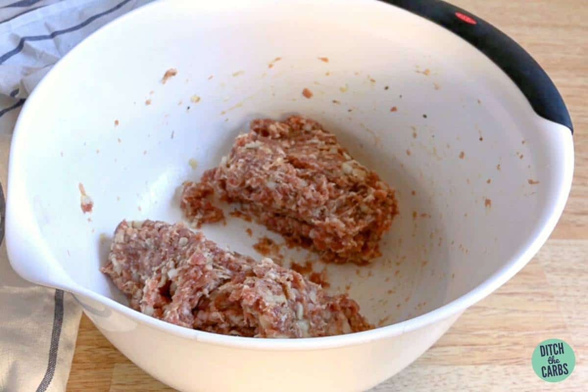 pork stuffing mixture in a white bowl