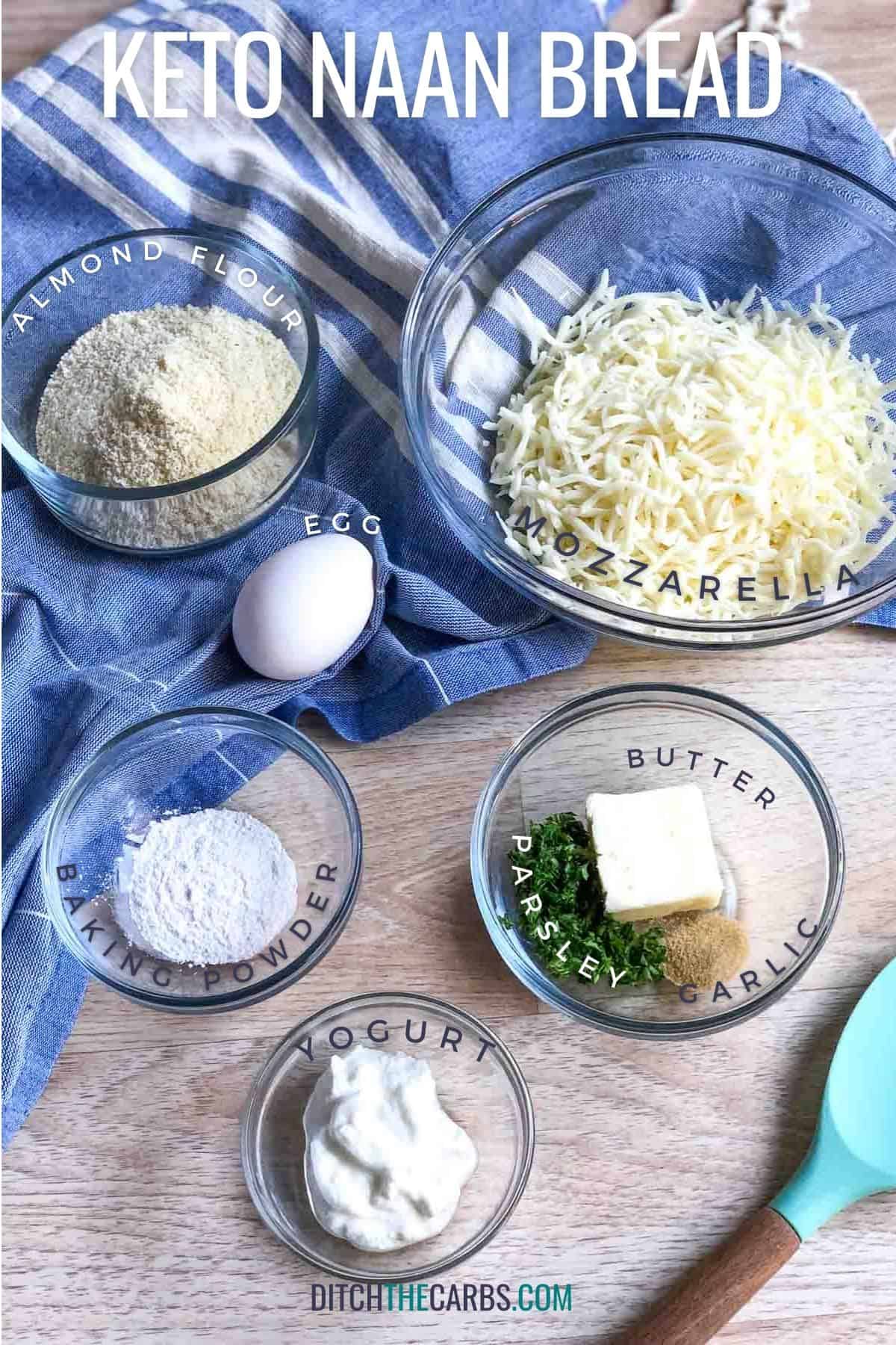 Ingredients needed for keto naan-almond flour, mozzarella cheese, eggs, butter, parsley, garlic, yogurt and baking powder.