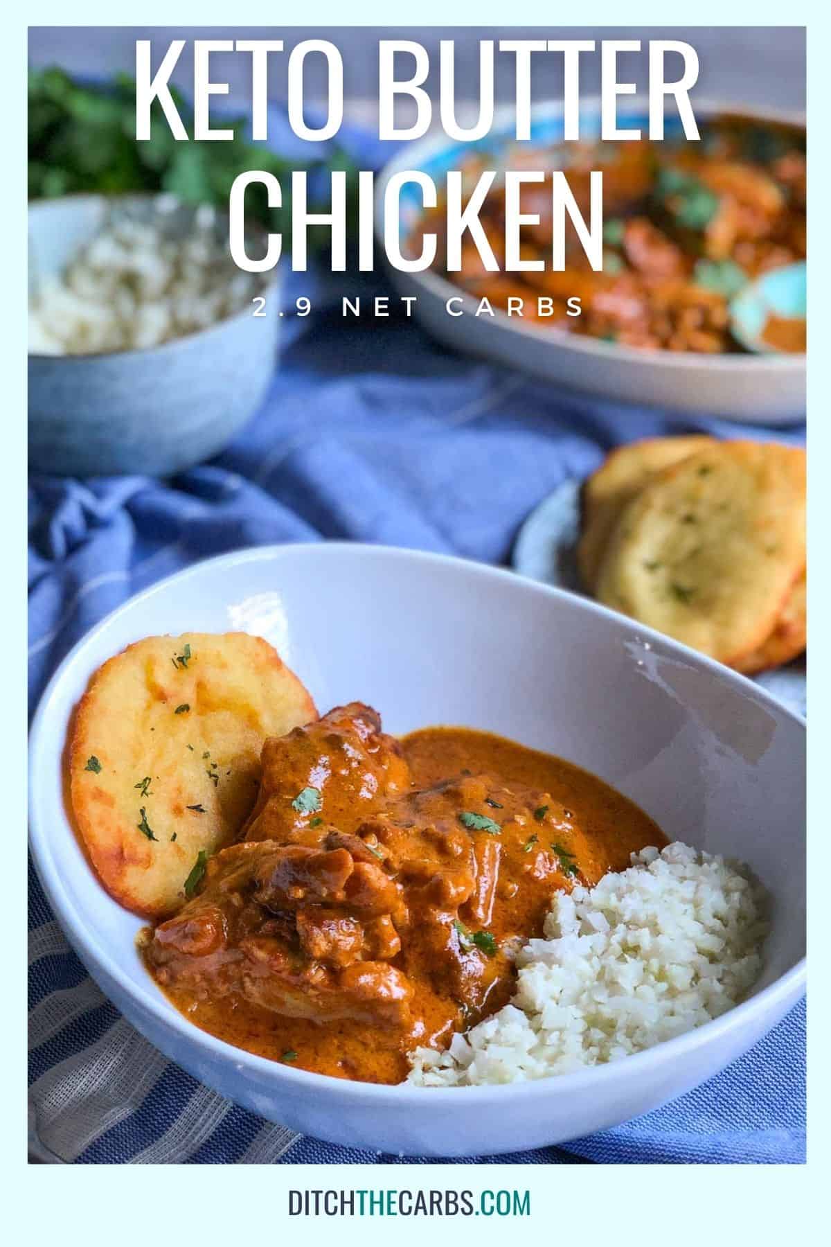 bowl of keto butter chicken served with a keto naan bread and cauliflower rice