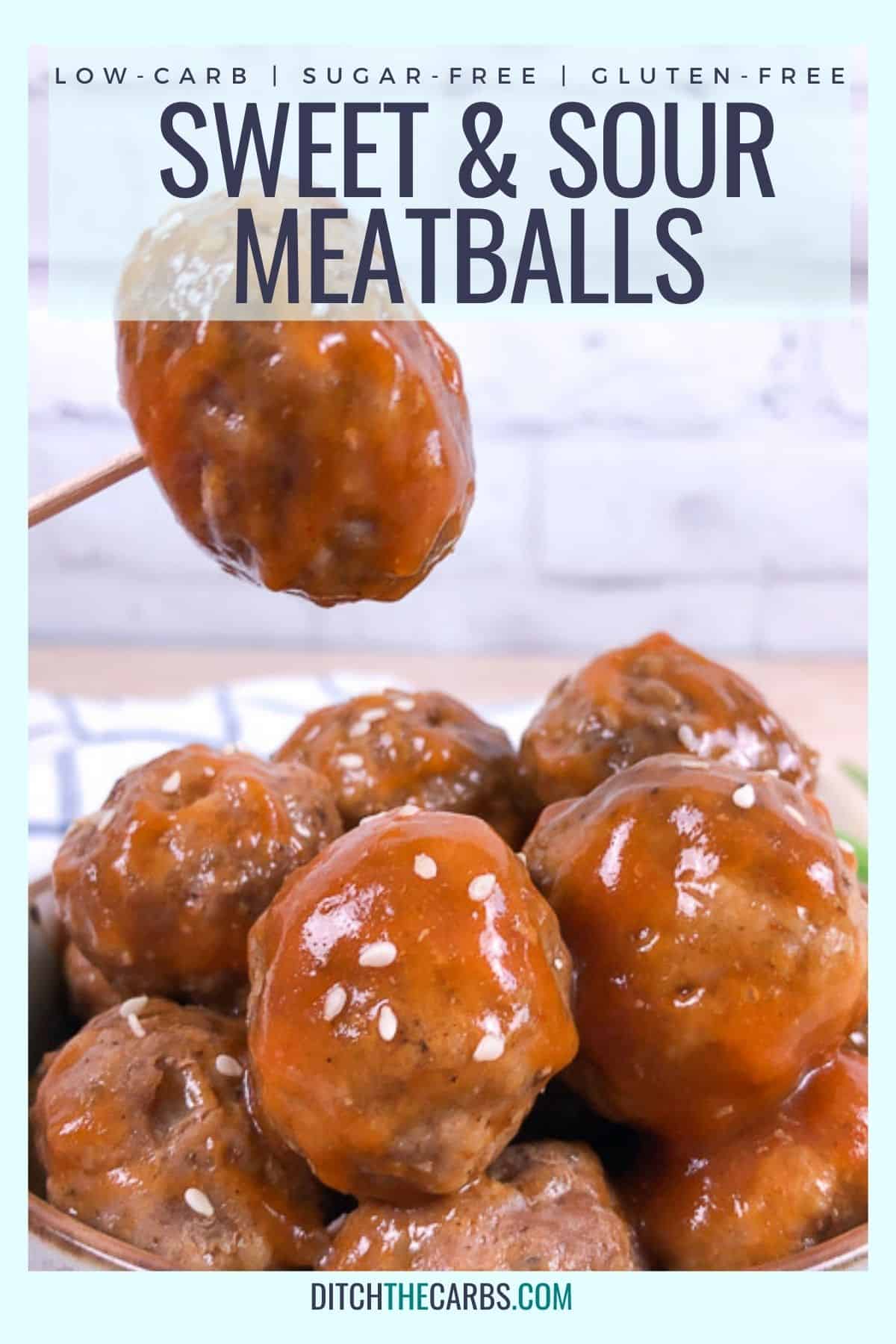 Sweet and sour keto meatballs in a bowl. One meatball is being lifted by a toothpick.