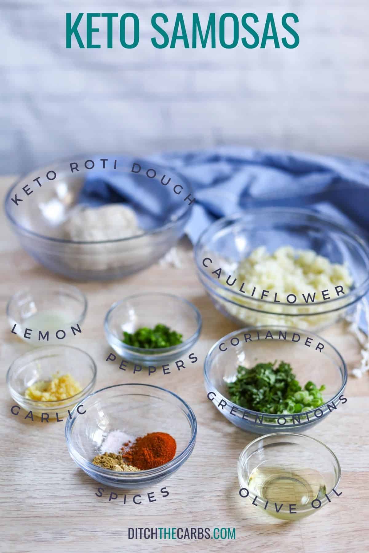 Ingredients needed to make keto samosas - cauliflower, lemon, garlic, spices, fresh herbs, oil, dough.