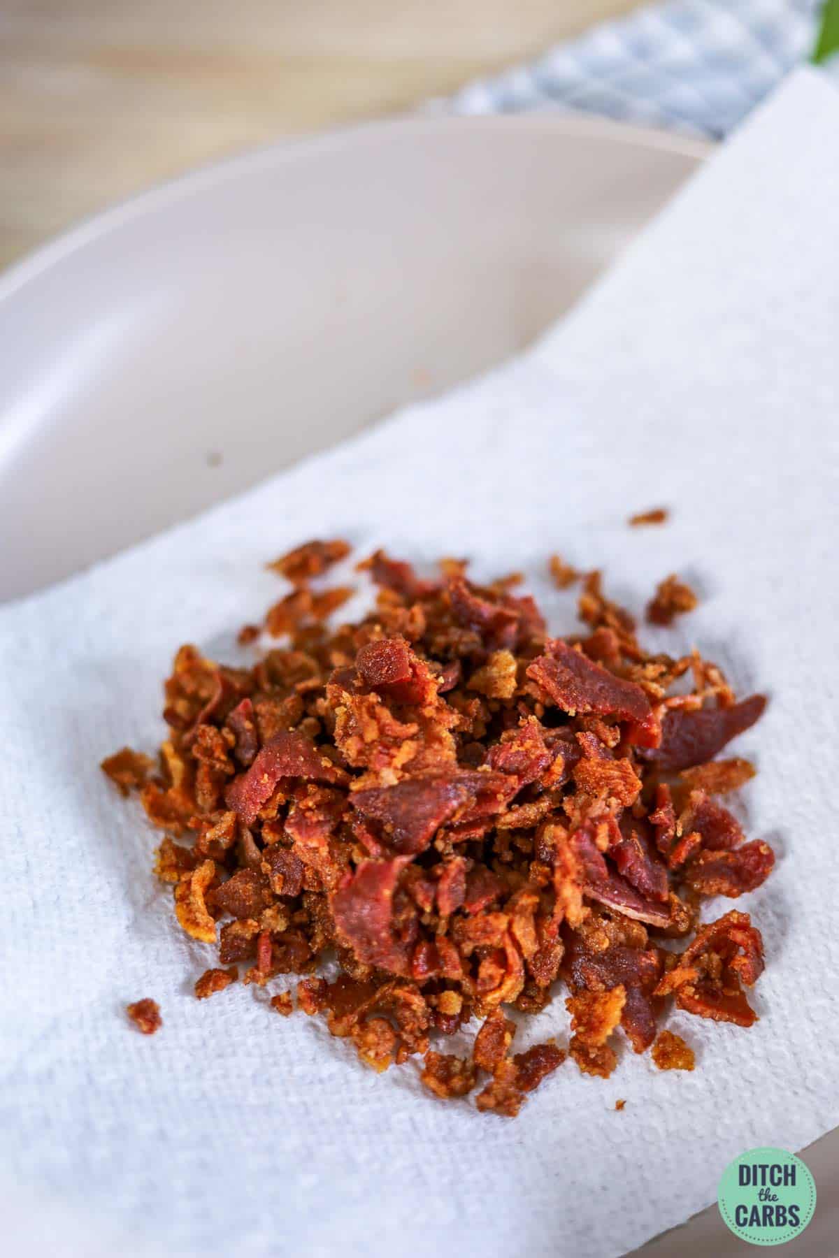 homemade bacon bits on a paper towel