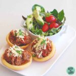 Keto taco cups with FatHead pastry served with salad and avocado