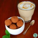 sugar-free chocolate mint truffles in a white bowl with a cup of coffee