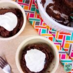 Instant pot chocolate pudding served and garnish with whipped cream