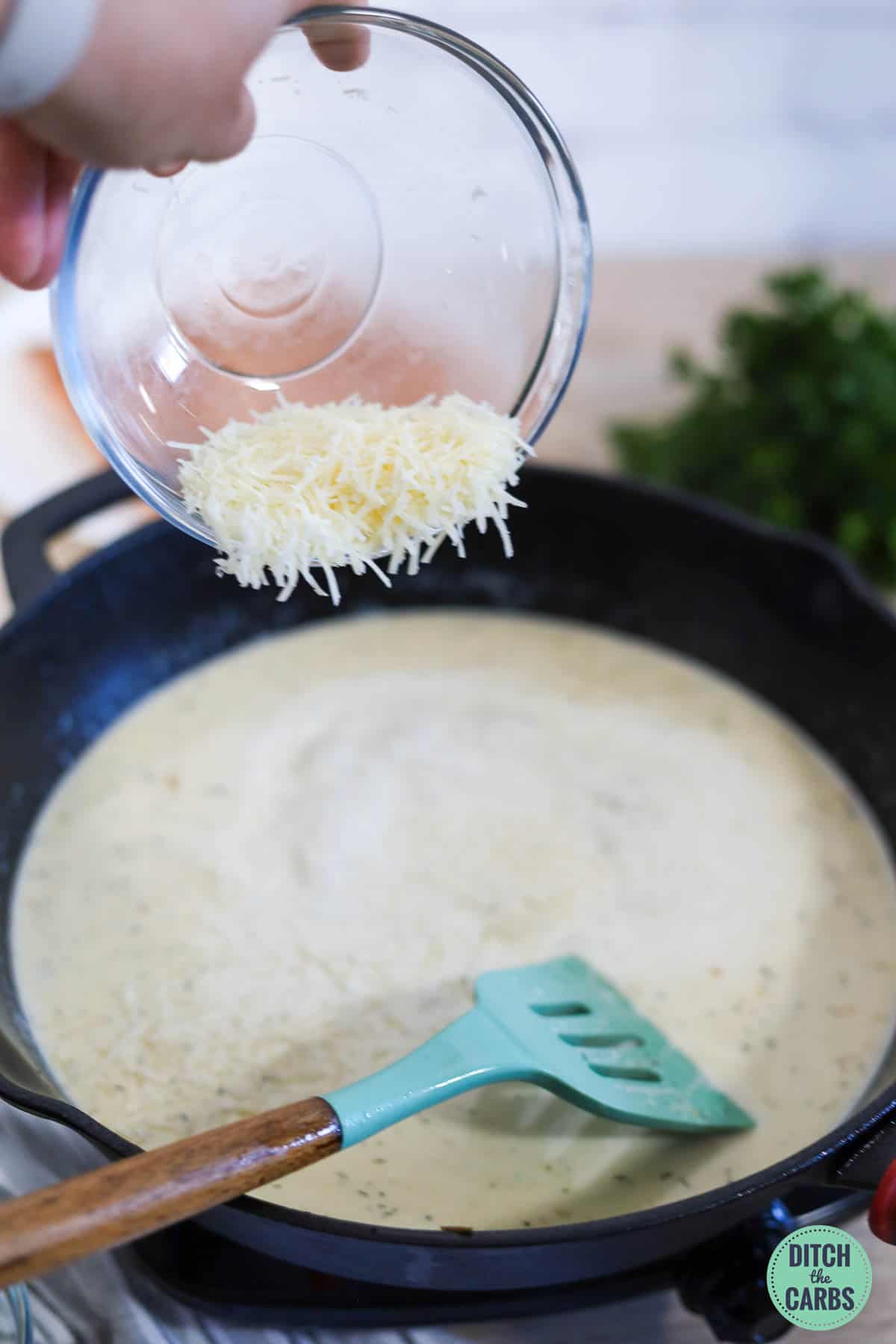 a cast iron pan with parmesan cheese