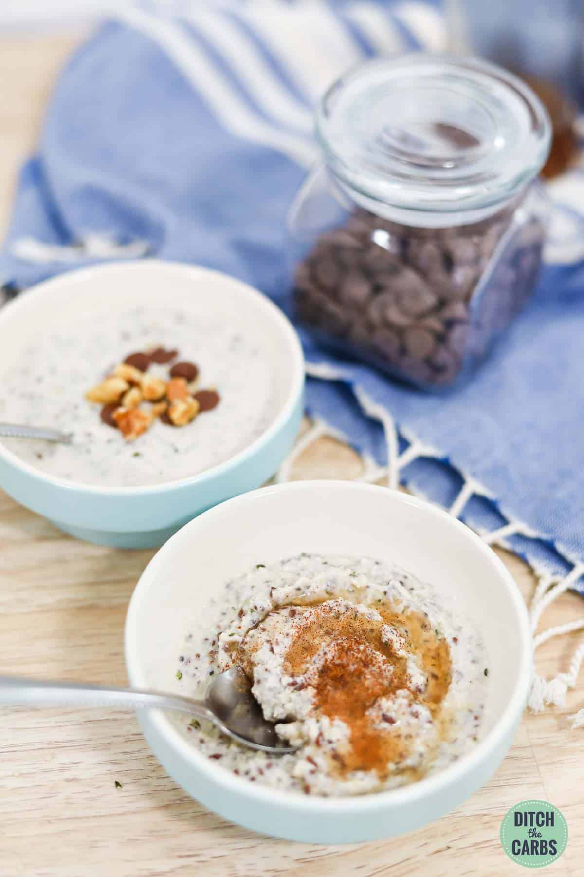 Two bowls of low-carb keto oatmeal with custom toppings.
