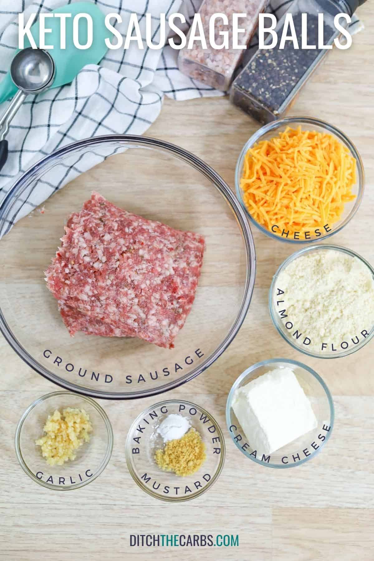 keto sausage balls ingredients measured out in glass bowls