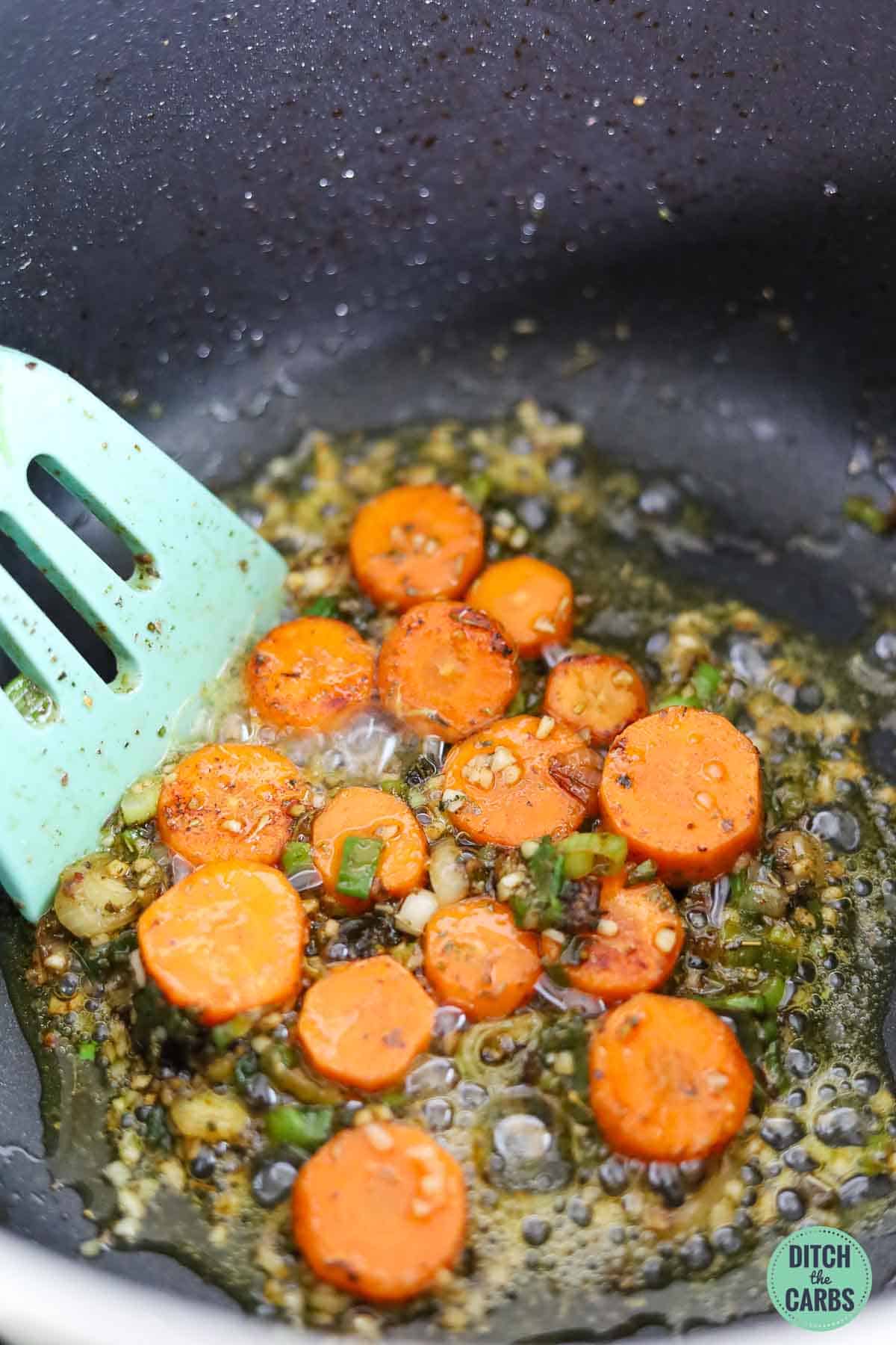 sautéing low carb vegetables in a pan of oil