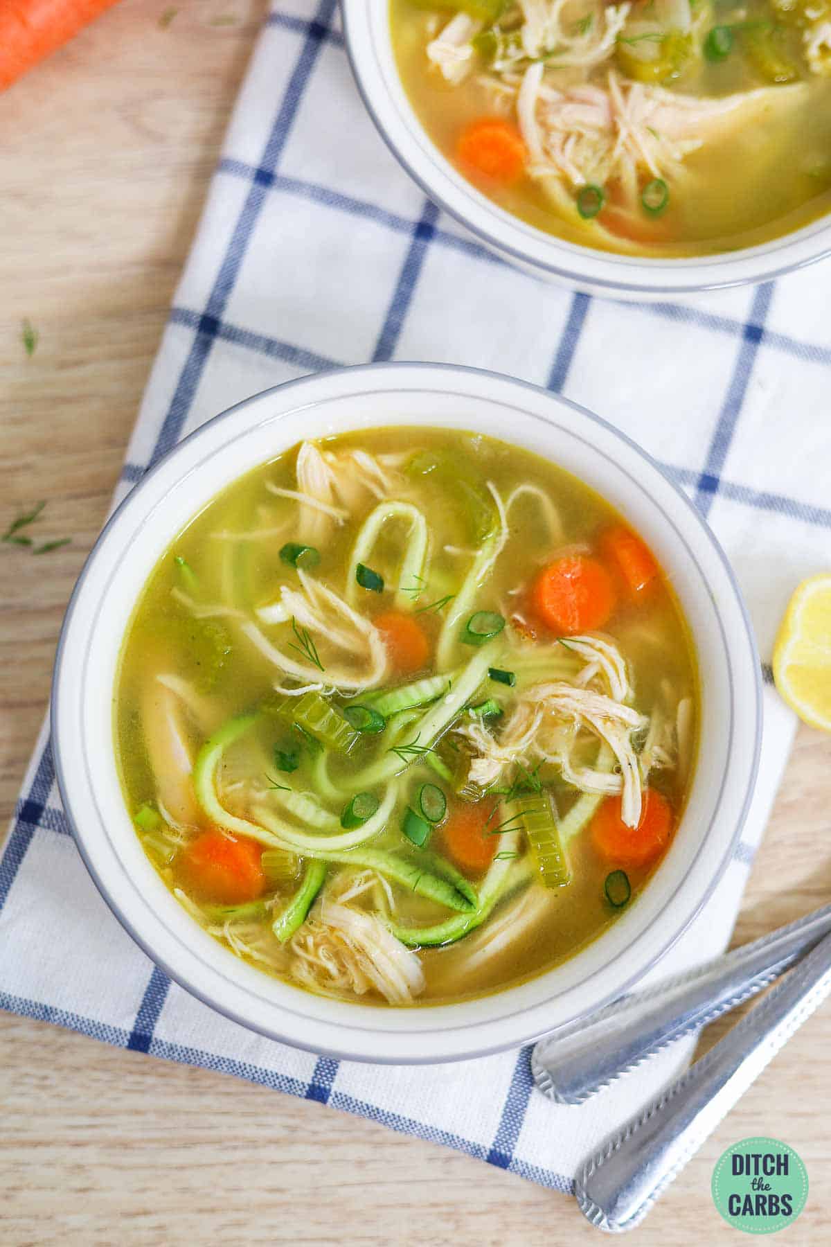 bowl of low carb chicken noodle soup alternative with zoodles