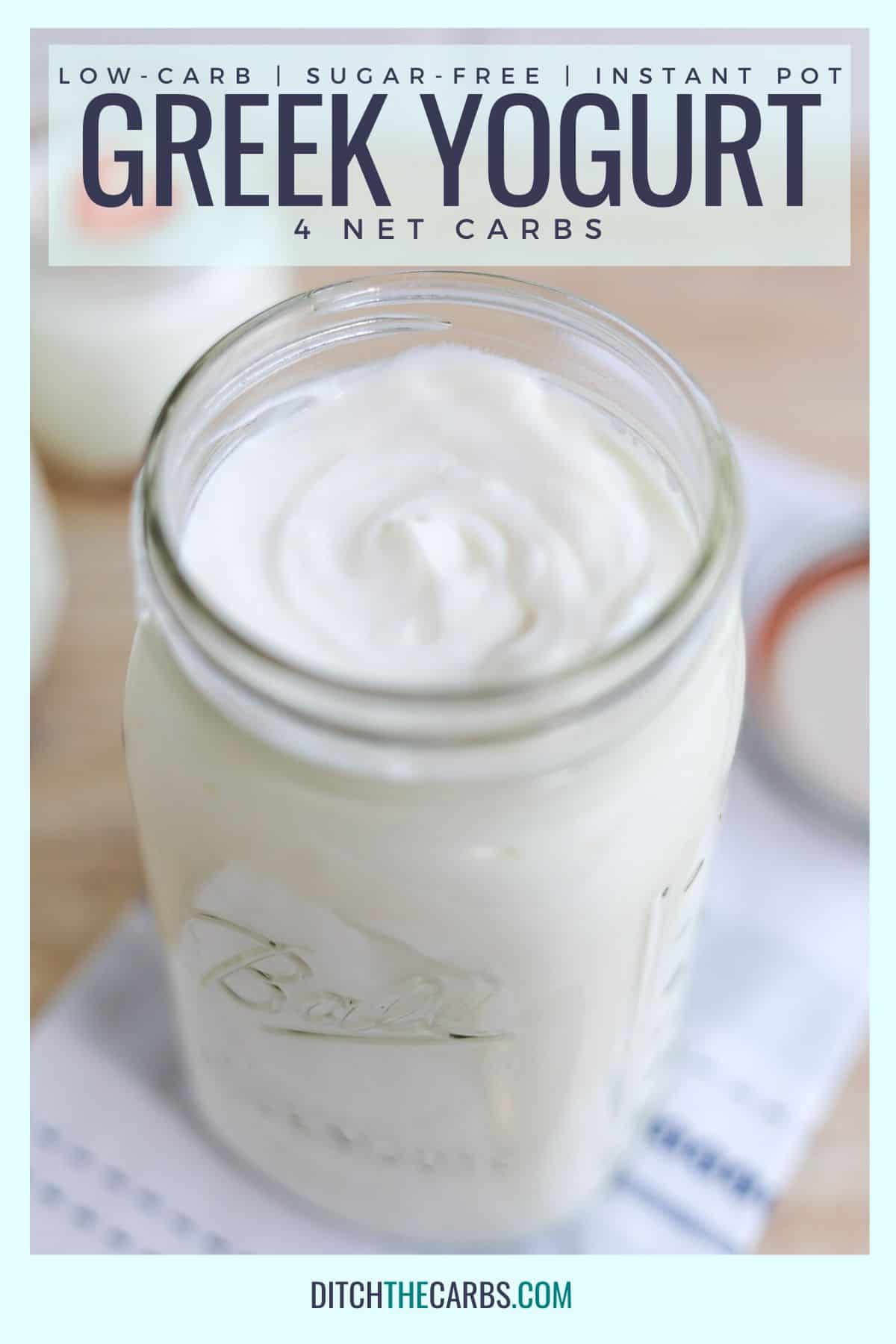 Low-carb Greek yogurt in a glass jar resting on a towel.